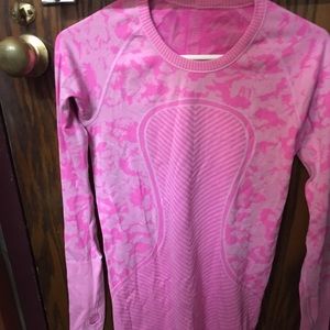 Lululemon long sleeved pink running top.